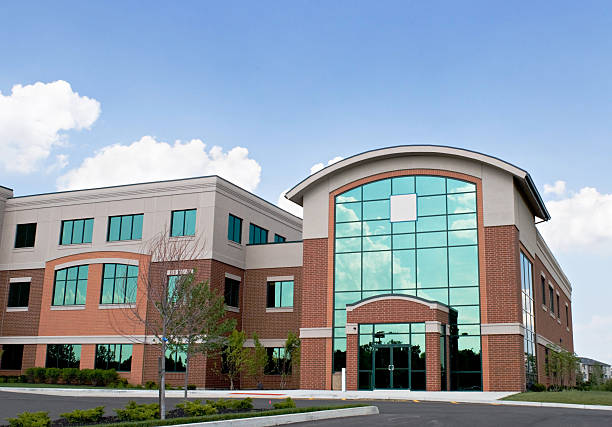 Red brick building with blue tinted glass windows. red brick building with blue tinted glass windows.